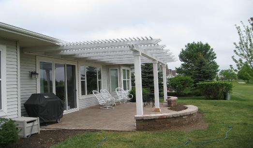 Brick Patio with Seatwall and Pergola