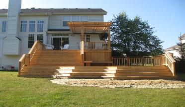 Cedar deck with grand stairs and cedar pergola Crystal Lake IL