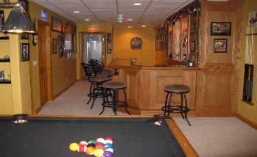 Finished Basement and Game Room With Custom Bar